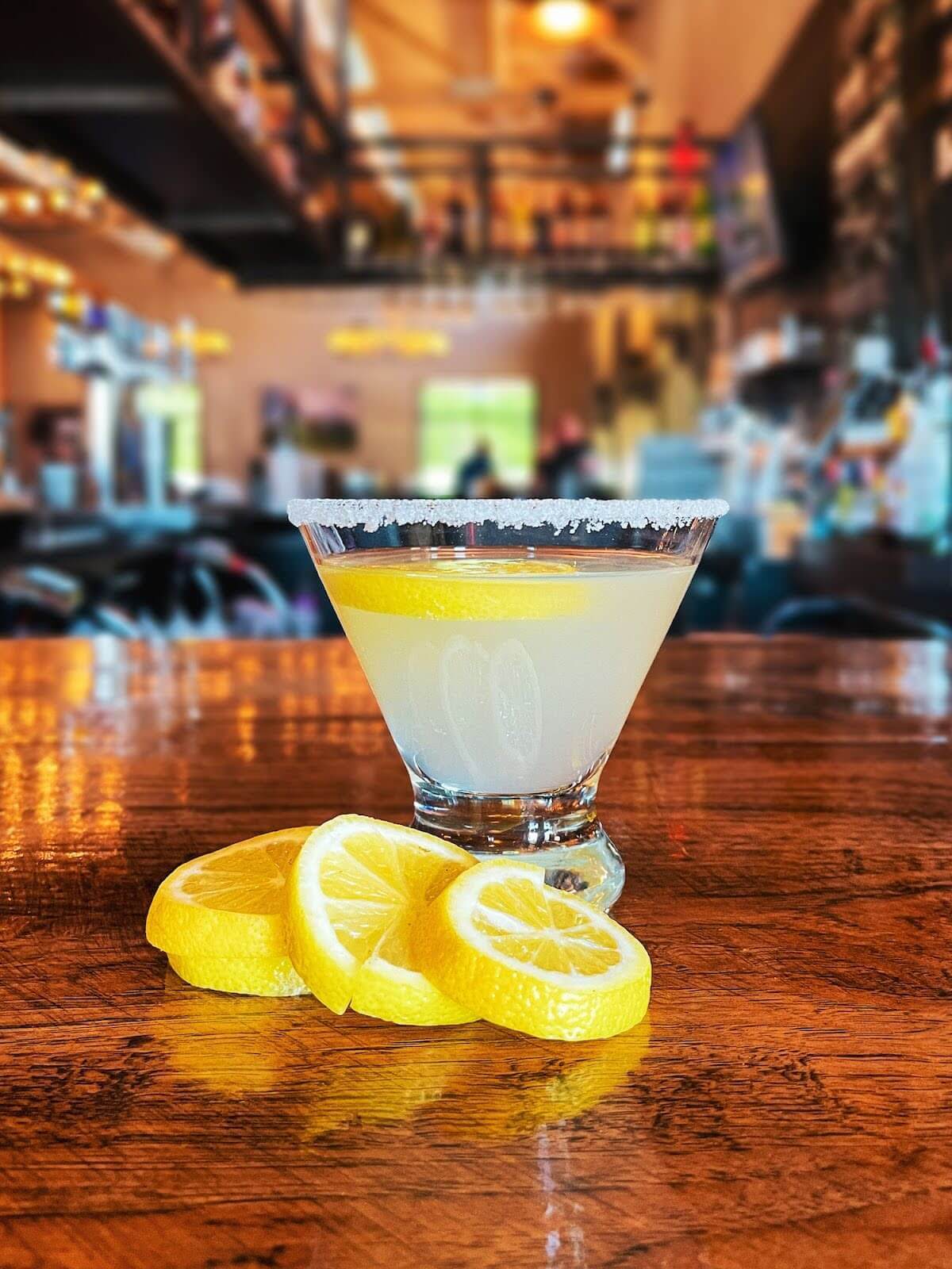 Lemondrop Martini on a bar table.